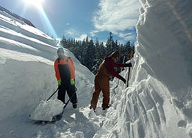 Mills Roofing team working in the snow